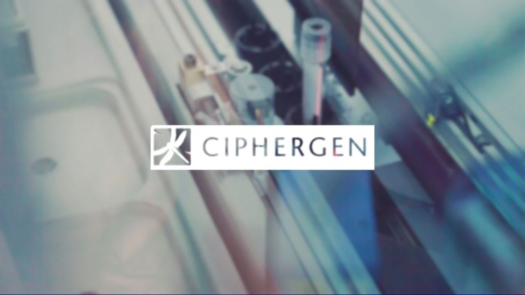 The Ciphergen company logo overlaid on a photo of a laboratory machine with a small sample in a test tube.