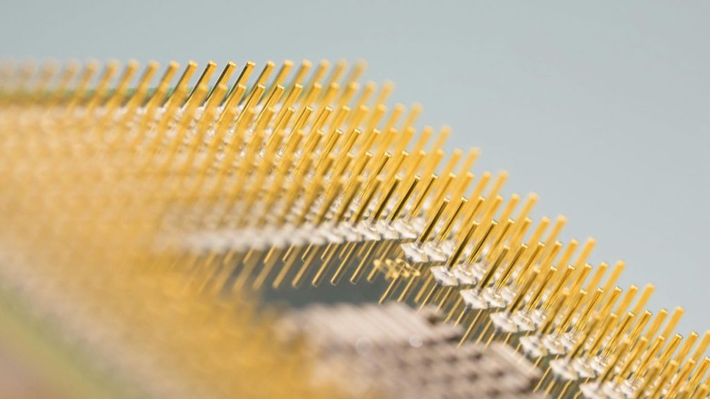 a close up image of a computer chip used to represent Element14's fabless chip design for broadband.
