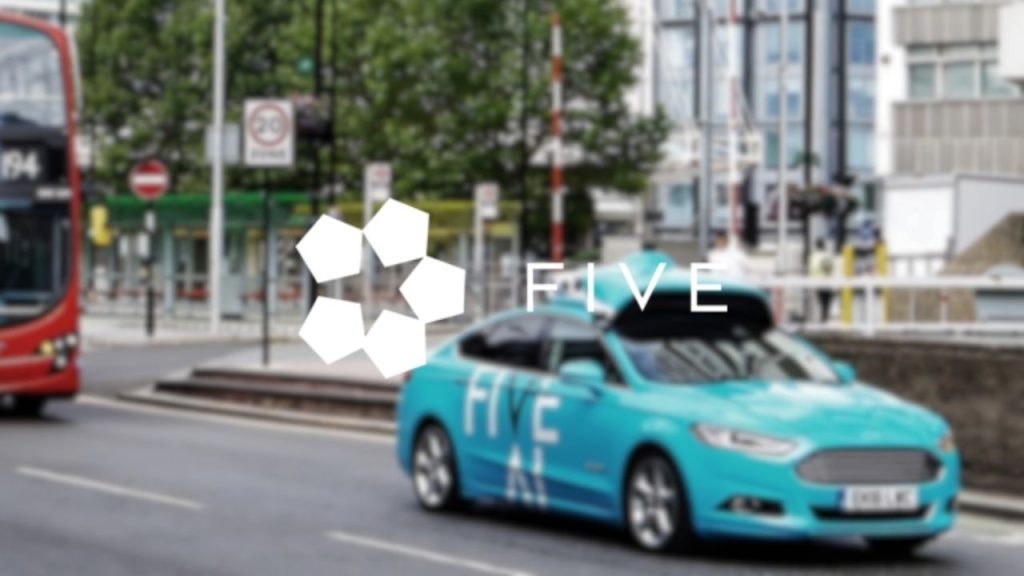 FiveAI company logo overlaid on a photo featuring a London street scene which features the FiveAI test autonomous vehicle, which is a Ford Mondeo with sensors and other equipment on its roof. The car is followed by a red double decker bus.