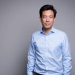 Jason Chin, founder and CEO of Constructive Bio standing for a professional photo.