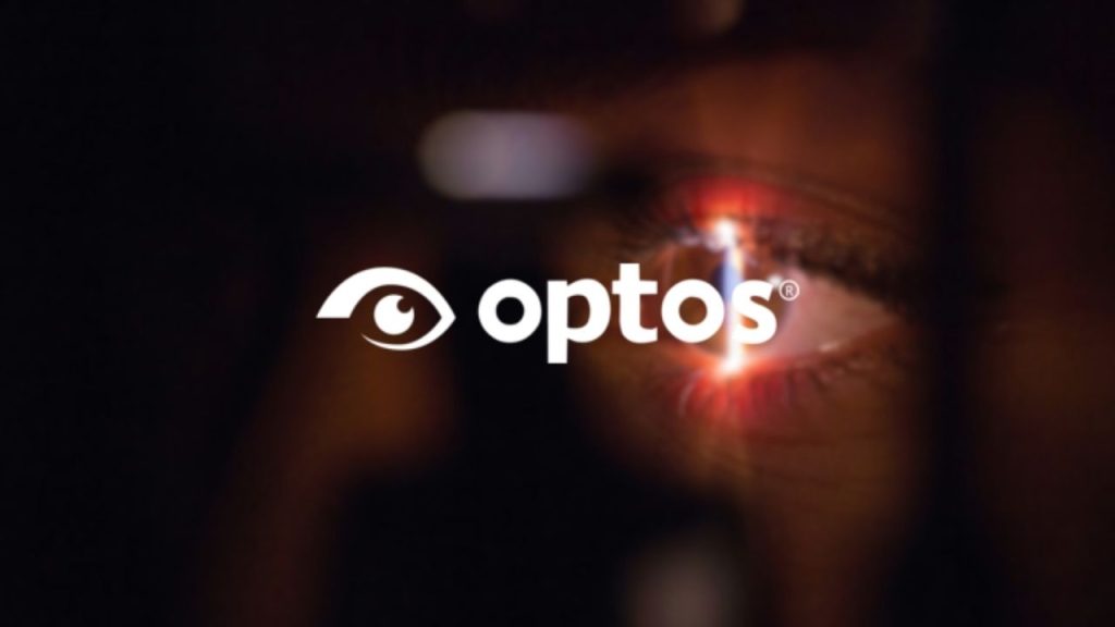 Optos company logo overlaid on a close up photo of a human eye with a beam of light projected down the centre of the iris, depicting the scanner which the company Optos developed to scan inside the back of the human eye.