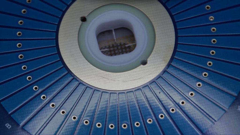 Close up photo of the graphene electronics production process, showing the wafer test.