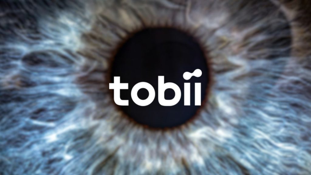 Tobii company logo overlaid on a macro image of the human eye which shows the iris. This image is representative of Tobii technology which tracks the human eye for intent analytics.