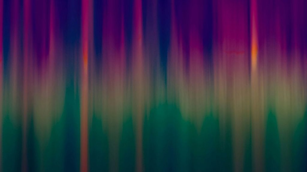 a computer-generated design of a speech soundwave in multiple colours to represent Speechmatics technology.