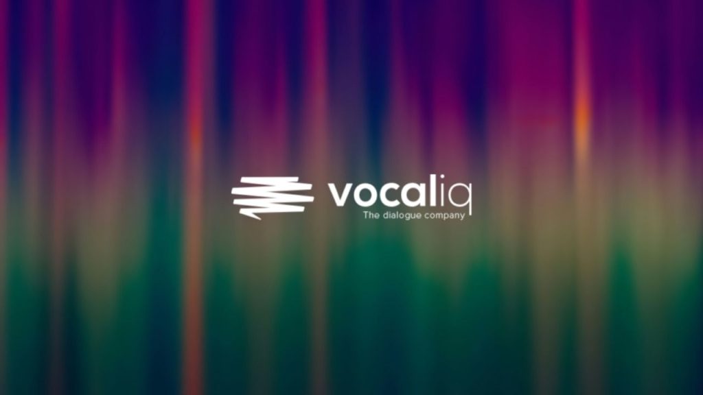 VocalIQ logo overlaid on a a computer-generated design of a speech soundwave in multiple colours to represent Speechmatics technology.