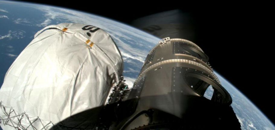 ATMOS Space Cargo Phoenix 1 capsule in orbit around the Earth for the Bandwagon3 mission with SpaceX.