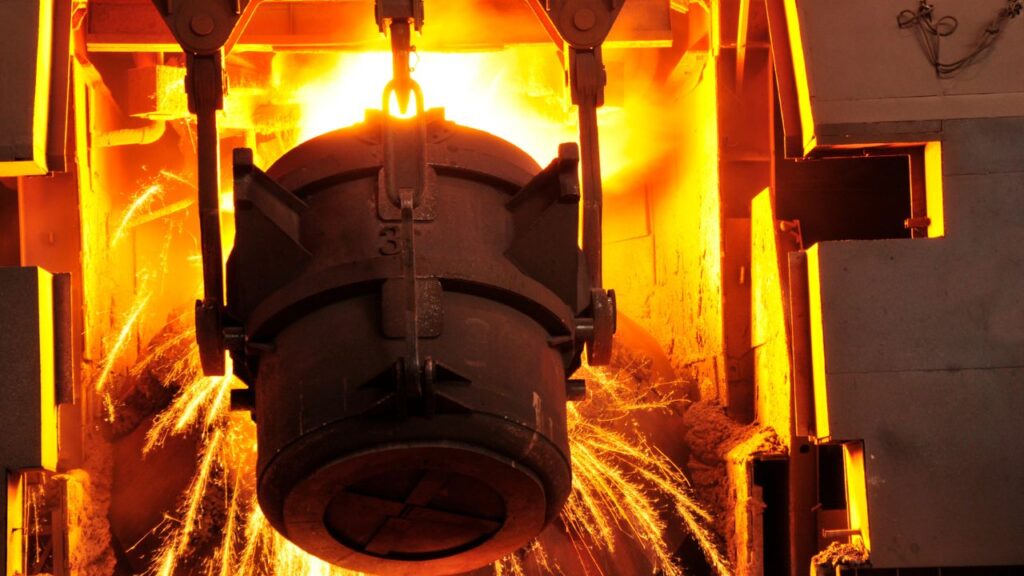 Steel smelting crucible full of red-hot liquid steel, which shows a stage of the process which HyperHeat enables with its energy efficient electrical heaters.