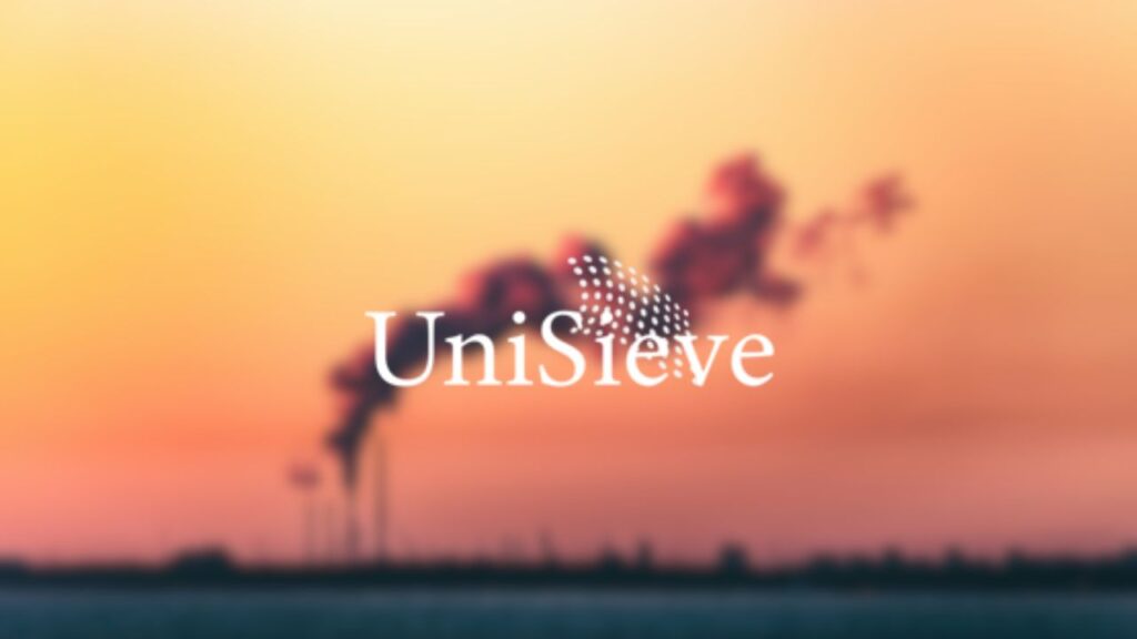 UniSieve company logo overlaid on a photo of an industrial chimney emitting pollution.