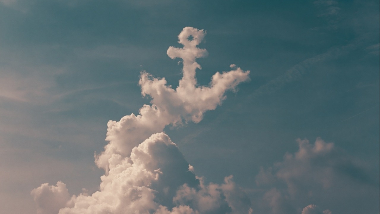 An AI-generated image of an anchor-shaped cloud in the sky.